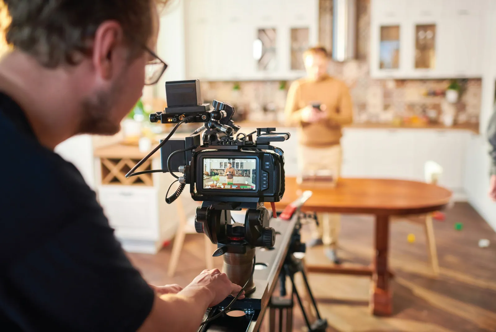 Mushroom Motion camera operator filming a scene on a cinema camera rig