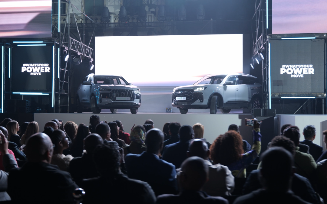 Mushroom Motion live event production — two vehicles revealed on stage to a seated audience at a large-scale brand launch event in South Africa